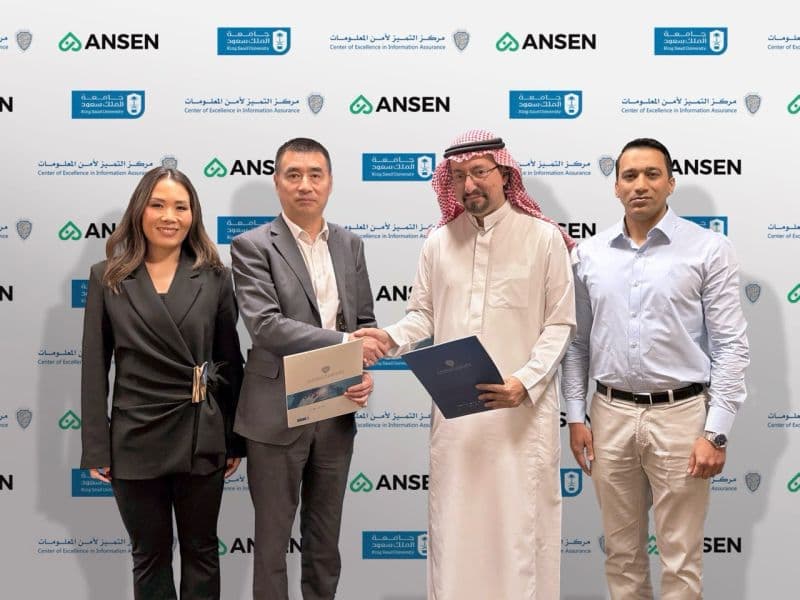 Ansen and King Saud University representatives at an AI cybersecurity collaboration signing